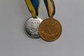 Old Ukraine gold and silver medals for excellence in high school graduation - back side