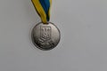 Old Ukraine silver medal for excellence in high school graduation - back side