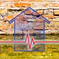 Old unhealthy brick wall damaged by rising damp - concept image with a chart about rising damp in buildings