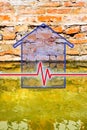 Old unhealthy brick wall damaged by rising damp - concept image