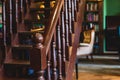 Old university college library interior with a bookshelves, books and bookcase, classic style school interior archive with wooden