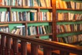 Old university college library interior with a bookshelves, books and bookcase, classic style school interior archive with wooden