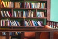 Old university college library interior with a bookshelves, books and bookcase, classic style school interior archive with wooden