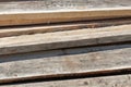 Old unplaned boards pile closeup Royalty Free Stock Photo