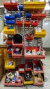 Old untidy spare parts rack in an engineers workshop