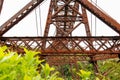 Old unused iron train bridge at the Old Coach Road, New Zealand