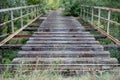 Old unused railway bridge. A small railway crossing over the riv Royalty Free Stock Photo