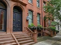 Old urban brownstone type townhouse with double door