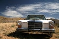 Old usa car in the desert Royalty Free Stock Photo