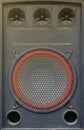 Old used audio speaker texture on dark blue