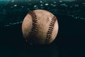 Old used baseball ball in water closeup Royalty Free Stock Photo