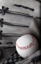 Old used baseball glove and ball isolated closeup Royalty Free Stock Photo