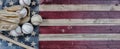 Old baseball objects on United States vintage wooden flag background. Baseball sports concept with copy space Royalty Free Stock Photo