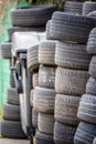 Old used car tires. A pile of black tires, abstract background. Royalty Free Stock Photo