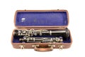 Old used clarinet in ancient case isolated Royalty Free Stock Photo