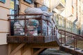 Old used clothes in plastic bags. New arrival of the goods in the second-hand store. Humanitarian aid for children affected by the Royalty Free Stock Photo