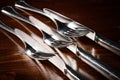 Old used cutlery on dark wooden table Royalty Free Stock Photo