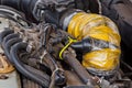 Old used diesel engine with rusty and dirty auto parts, water infiltration and bad car maintenance