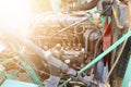 Close-up of an old used diesel engine with rusty and dirty car parts, water infiltration and poor car maintenance