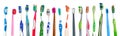 Old, used and dirty colorful toothbrushes on white background