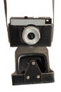 Old used dirty old-fashioned film photocamera front view with a cover Royalty Free Stock Photo