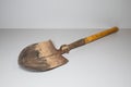 Old, used folding sapper, engineer`s shovel. Compact and universal shovel ready to use