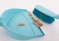 Old and used hearing aids, small plastic broom and shovel - Electronic waste Royalty Free Stock Photo