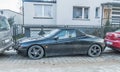 Old black small Italian popular private car Alfa Romeo Spider GTV