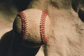 Old used texture of baseball on linen background