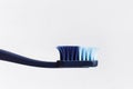 Old used toothbrush on white background