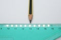 Old used triangle ruler and a pencil. Ruler and pencil. Royalty Free Stock Photo