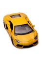 An old used yellow toy sports car Royalty Free Stock Photo