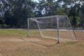 Old vacant football soccer goal gate in rural grass field in Chiang Mai,Thailand Royalty Free Stock Photo