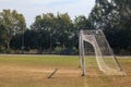 Old vacant football soccer goal gate in rural grass field in Chiang Mai,Thailand Royalty Free Stock Photo