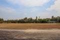 Old vacant football soccer goal gate in rural grass field in Chiang Mai,Thailand Royalty Free Stock Photo