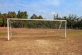 Old vacant football soccer goal gate in rural grass field in Chiang Mai,Thailand Royalty Free Stock Photo