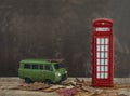 Old van and vintage red phone booth Royalty Free Stock Photo