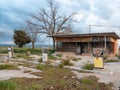 Old vandalized and dilapidated service station from the 60s