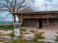 Old vandalized and dilapidated service station from the 60s