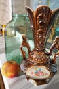 old vase, glass jar and apple