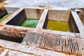 Old vats with a dye in the Marrakesh tannery. Morocco