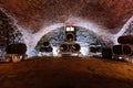 Old red brick vaulted wine cellar with barrels Royalty Free Stock Photo