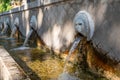 Old venetian fountain with lions heads in Spili, Crete island, Greece Royalty Free Stock Photo