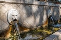 Old venetian fountain with lions heads in Spili, Crete island, Greece Royalty Free Stock Photo