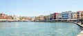 Old Venetian Harbour in Chania, Greece. Beautiful Bay with Multicolored Buildings, Hotels, Taverns and Cafes at the Seafront.