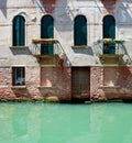 Old venetian house standing in water Royalty Free Stock Photo