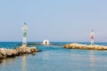 Old venetian lighthouse at harbor in Crete, Greece. Small cretan village Kavros.