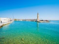 Old venetian lighthouse at the harbor. Rethymno, Crete, Greece