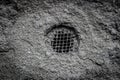 Old vent hole on the background of a concrete surface Royalty Free Stock Photo