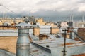 Old ventilation pipe on the roof of the apartment building